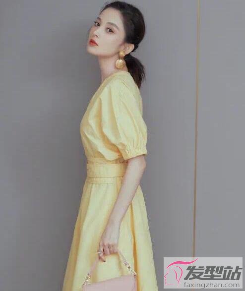 女明星淡黃長裙發(fā)型